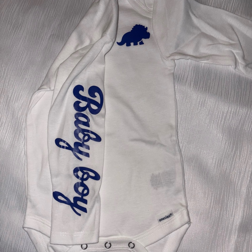 White Baby Boy Onesie with Blue Dinosaur Print